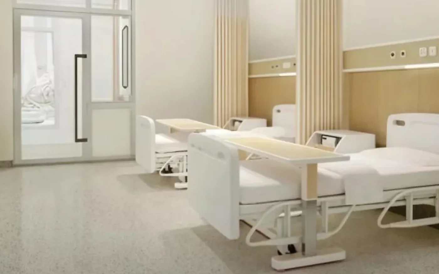 habitación hospitalaria clara con cama y mobiliario de apoyo